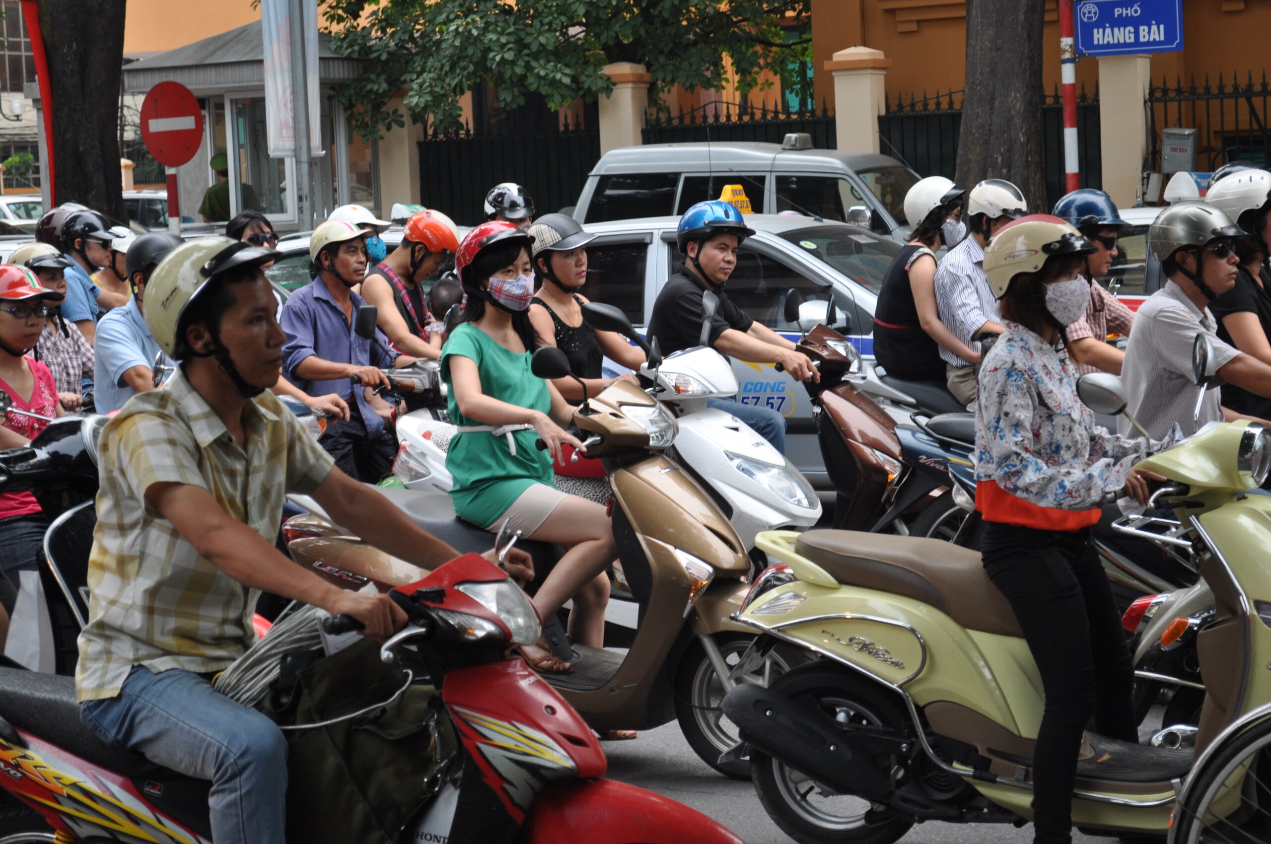 A crowd of motorcyclists on a Vietnamese street